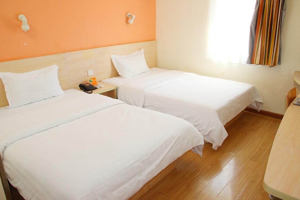 7Days Inn Qingdao Haiyunan Xinglong Road Room photo